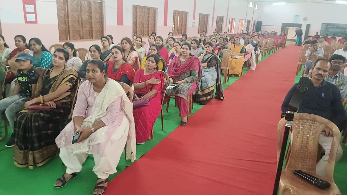 Families seated at the Smart Parent Smart Child programme